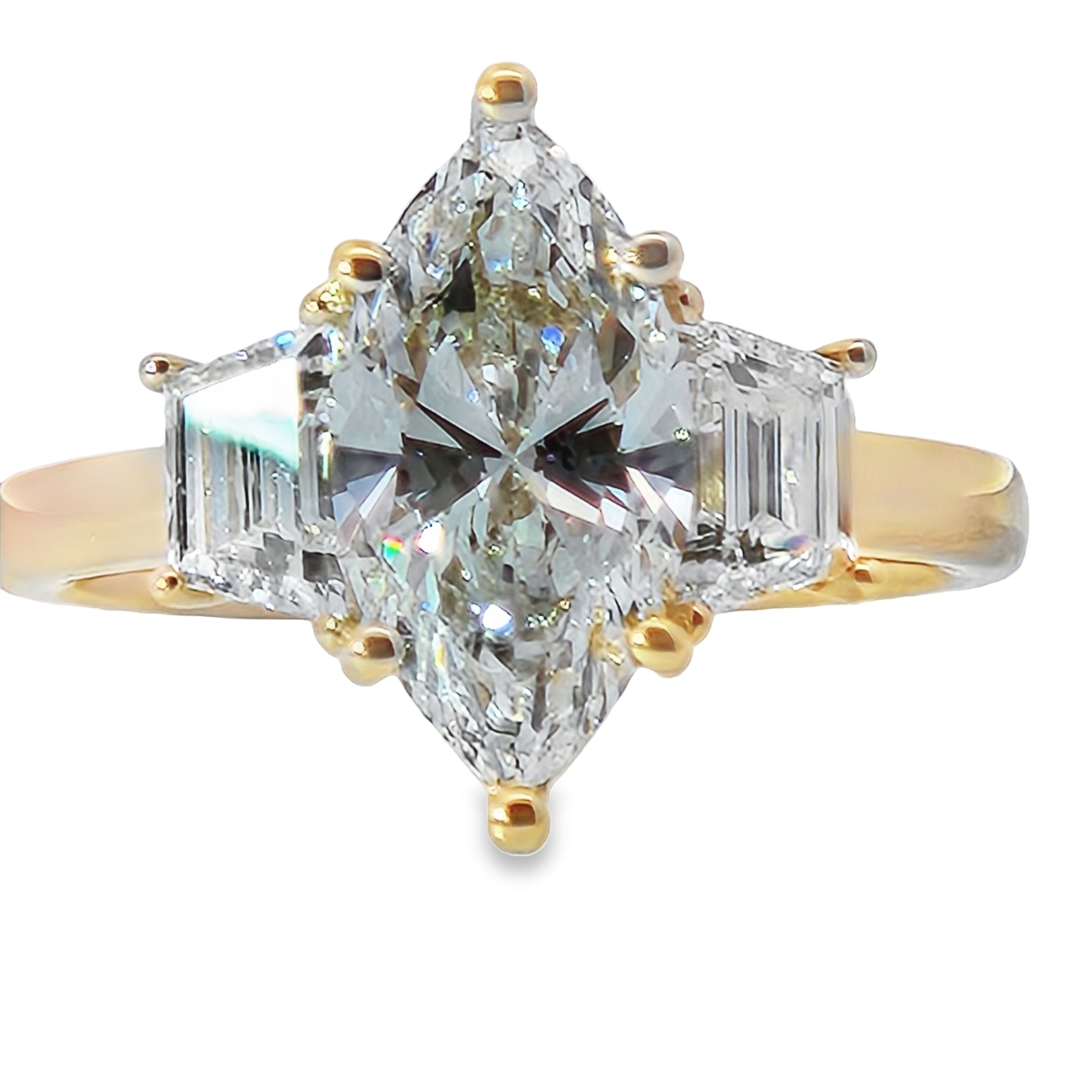 Lab Grown - 14Ky 2.80 Cttw E Vs1 Marq. Center W/Trapezoid Side Stones 3 Stone Ring
1Mq=2.07Ct 
Igi Lg598376773