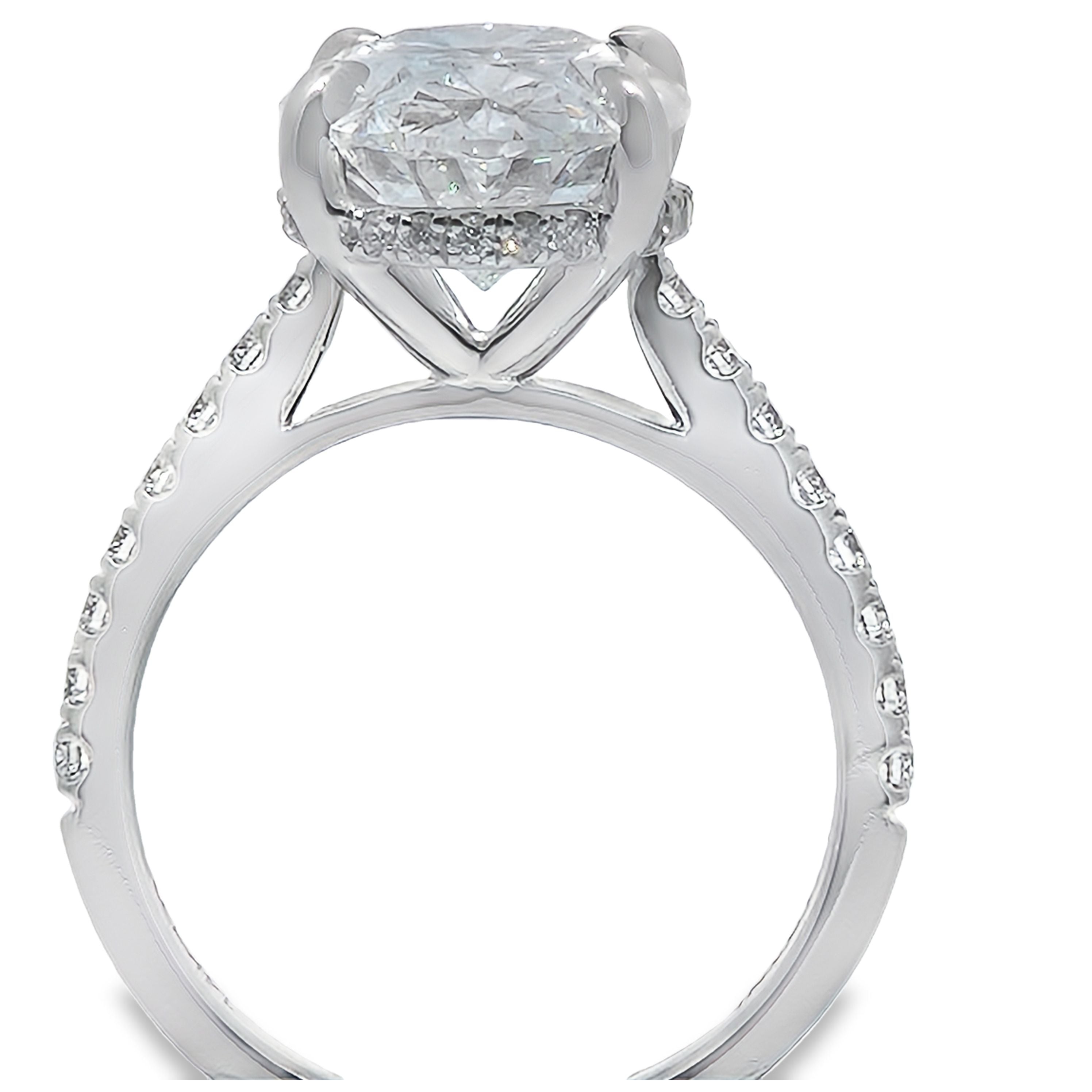Lab Grown - 14Kw 5.38Cttw E Vs1 Oval Hidden Halo Ring
1Ov=5.08Ct
Igi Cert Lg642479499