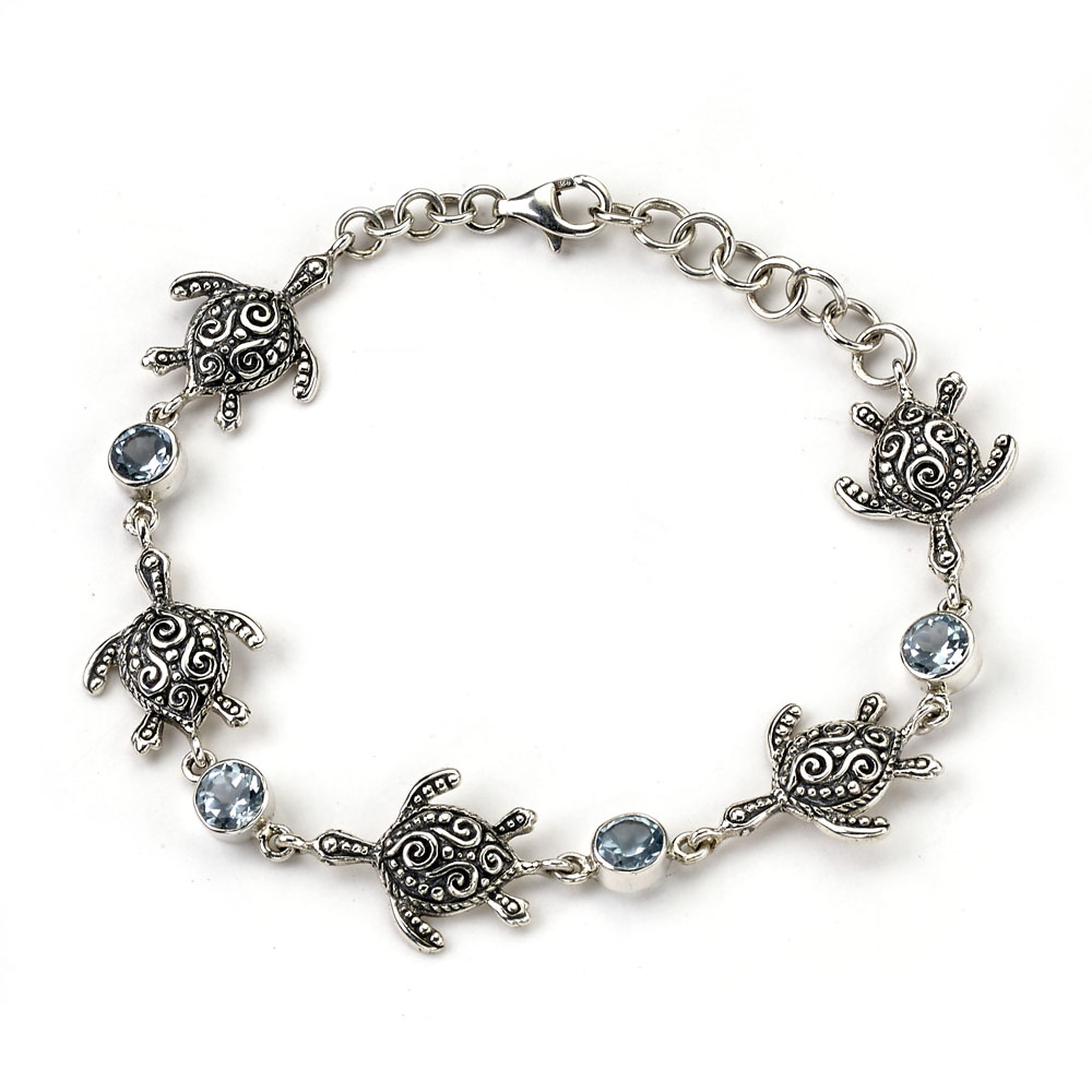 Ss Turtle & Rnd Blue Topaz Station Bracelet