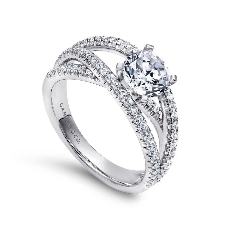 14kw .57ct Dia Semi-Mount    Our exclusive free form engagement ring. Includes three carefully designed diamond rows that are the perfect compliment to your center stone.