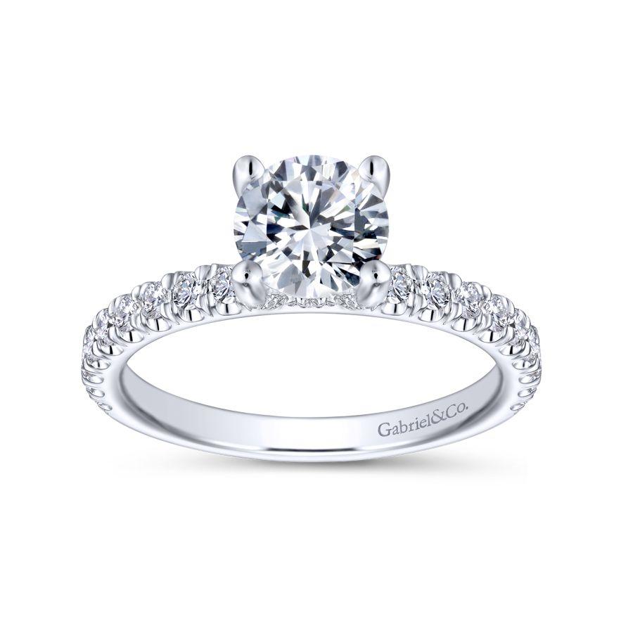 -14kw .49cttw Dia Accent Gallery Eng Ring Mounting    The perfect choice for your perfect girl  this 0.49ct diamond engagement ring effortlessly flatters the 1ct round center stone of your choosing. Accent diamonds glisten throughout the top half o