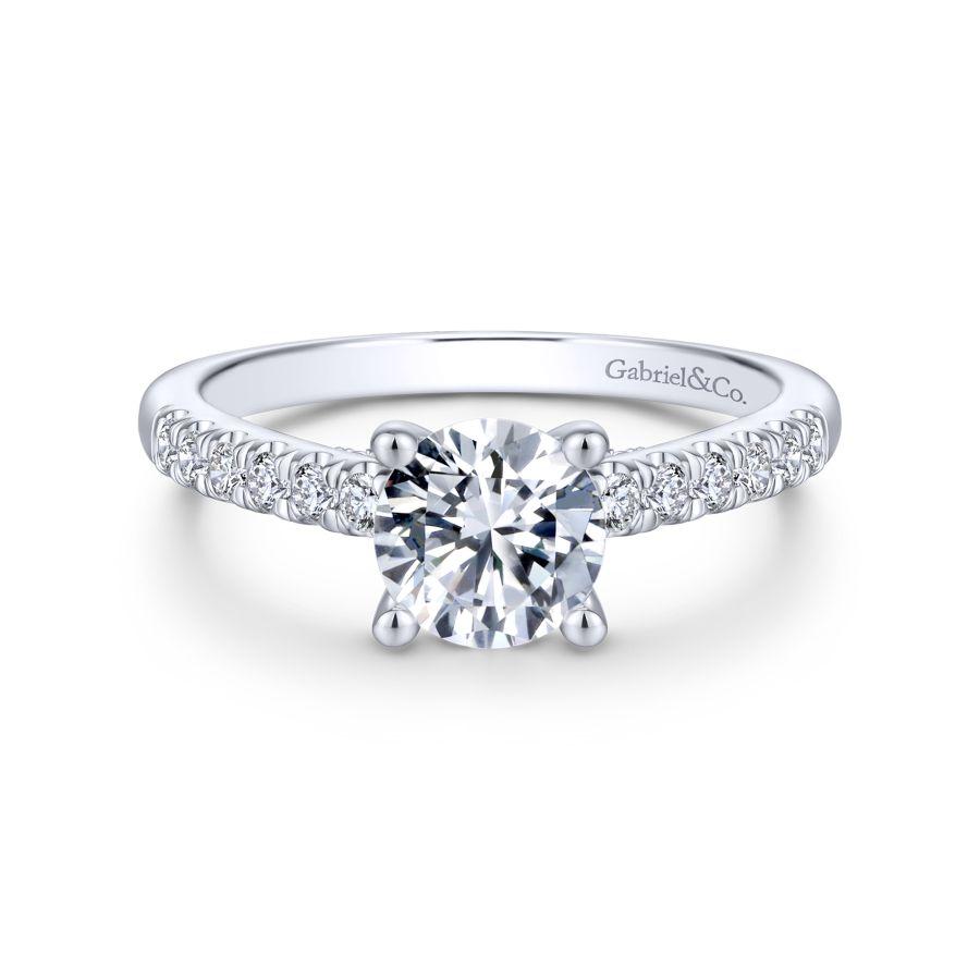 -14kw .39cttw Dia Accent Under Gallery Eng Ring Mounting    Gaze at Gabriel & Co. flawless composition of diamonds and 14k white gold creating this stunning round diamond engagement ring.