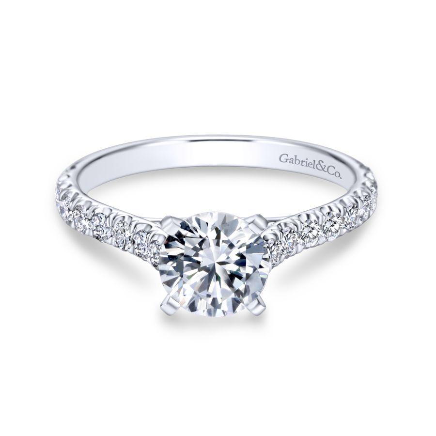 -14kw .51cttw Shared Prong Eng Ring Mounting    Adorned with diamonds along it